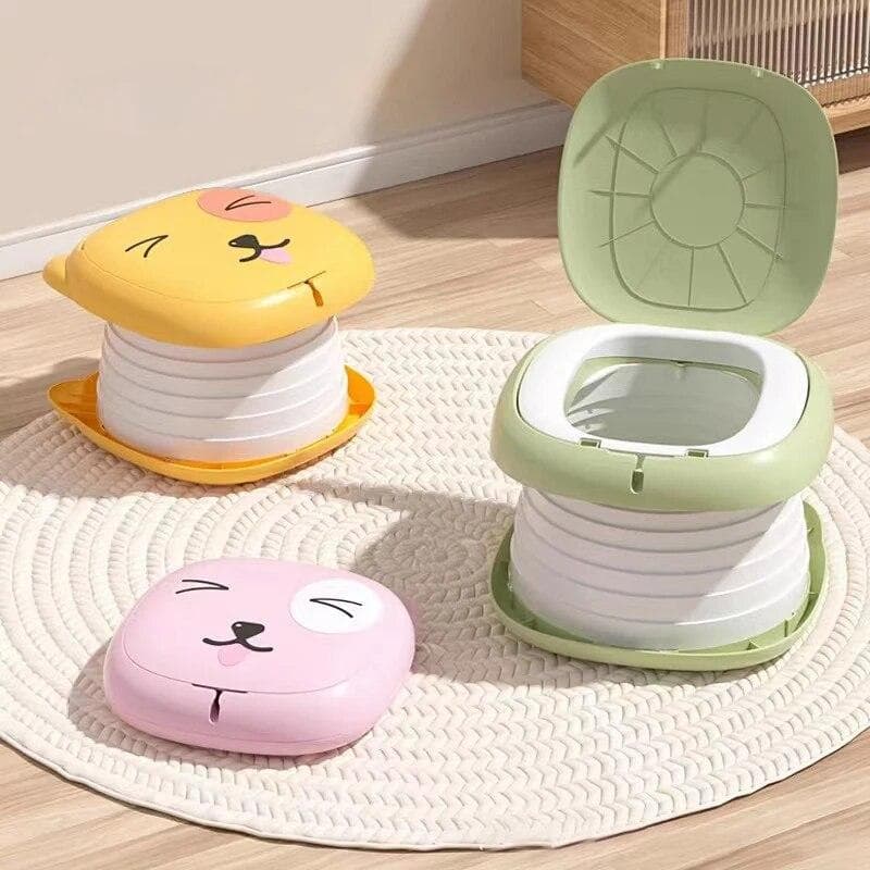 Children's Folding Toilet Baby Travel Toilet Portable Children's Potty Car Sealed Anti-odor Urinal pink